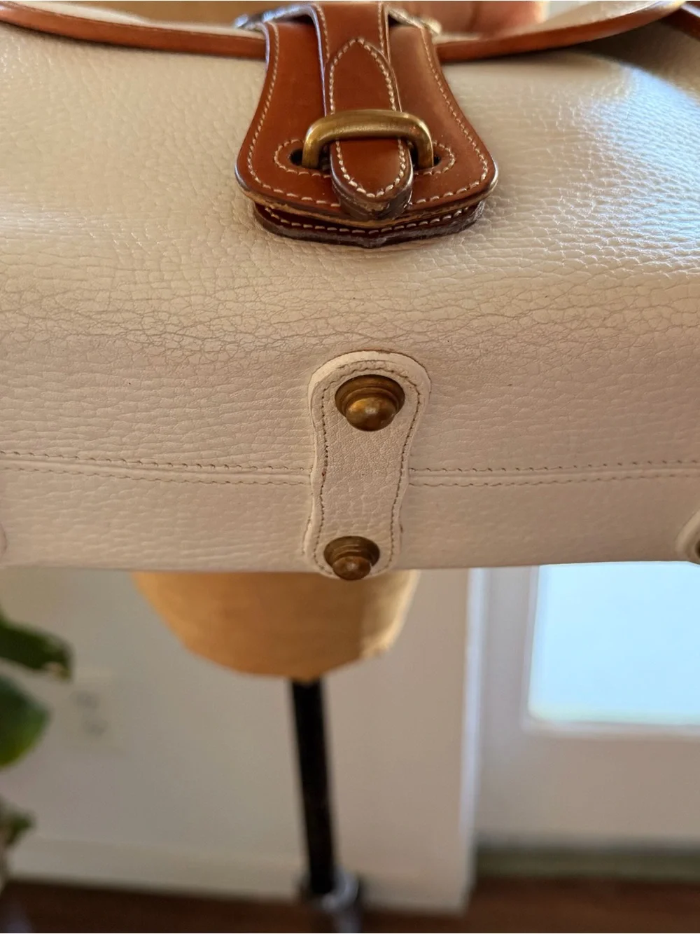 Dooney & Bourke cream pebbled